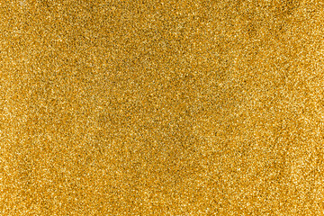 Gold background with glitter, lights. Christmas background, texture