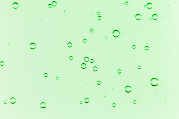 Liquid cream gel, green blue cosmetic texture with bubbles