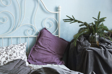Messy bedroom with gray cotton linen.