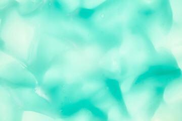 Liquid cream gel, green blue cosmetic texture with bubbles