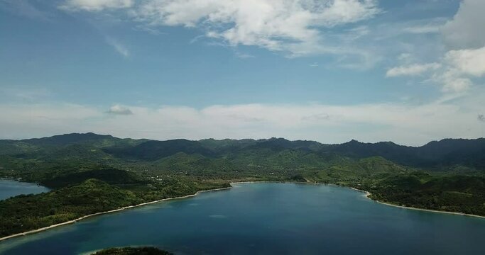aerial seascape, tropical vacation and island hopping concept. Gilli air island and Lombok . Indonesia, south Gili islands. Gili Asahan island. A strip of sand on the beach and blue sea with corals