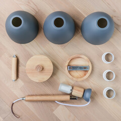 Assembling furniture at home. Self-assembly of the chandelier. Details of the luster laid out on...