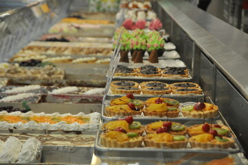 Assorted Pastries and Desserts in a Bakery Display