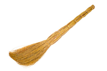 Straw besom close up isolated on white background