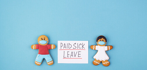 Gingerbread men in a mask with the inscription paid sick leave