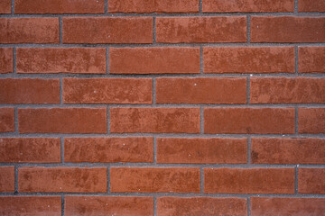 Brick wall. Texture of red brick with gray filling