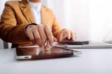Fototapeta premium Searching Browsing Internet Data Information with blank search bar.businessman working with smart phone, tablet and laptop computer on desk in office. Networking Concept