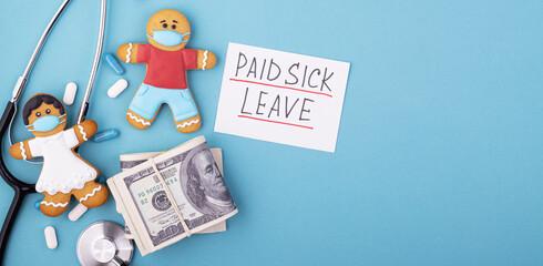 Gingerbread men in a mask with a wad of money and the inscription paid sick leave