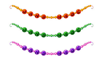 Set of three different colored beads with the inscription Hand Made on white background	