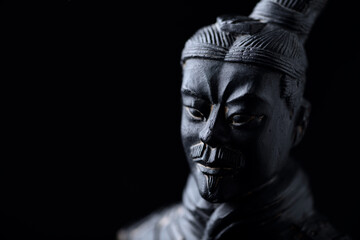 Fototapeta na wymiar Chinese Warrior isolated on black background. Close up. 