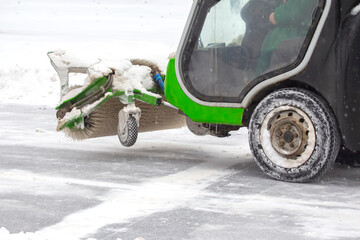special machine for snow removal cleans the road