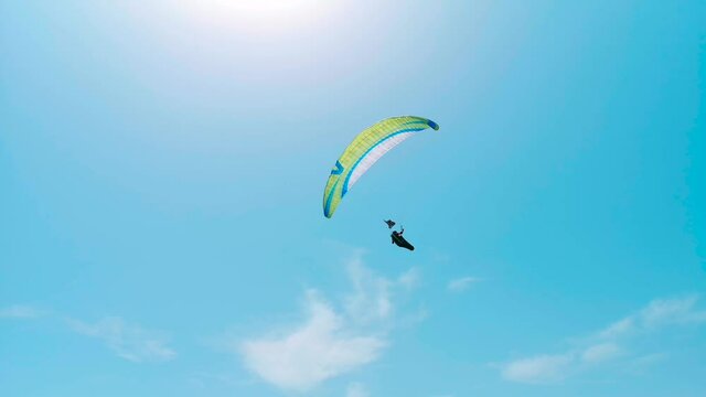 sky diving from plane parachute paragliding sport paraglider fly flying blue extreme air freedom adventure gliding flight glider paraglide high skydiving fun wind activity leisure clouds cloud par