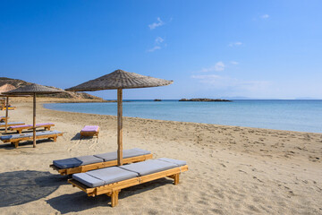 Manganari beach on Ios island, one of the most picturesque beaches with golden sand and crystal waters. Cyclades, Greece