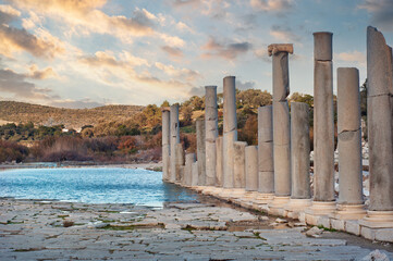 Patara ancient city columns with cloudy sky