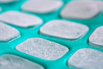 ice cubes in green silicone mold