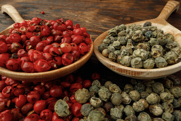 Pile of peppercorn on wooden table macro