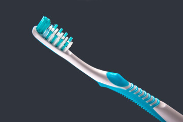 toothbrush close-up on a dark background. oral hygiene