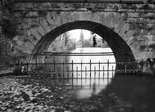 An inusual view of Bruges captured from Minnewater Park