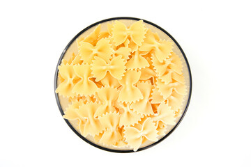 italian pasta in a plate on a white plate. flour products and food in cooking