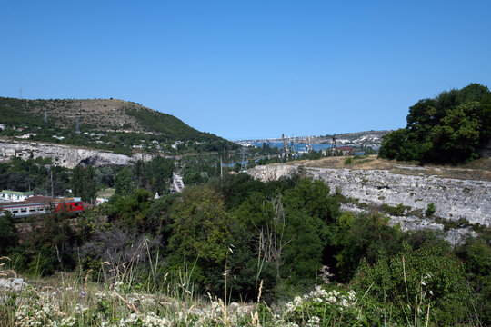 Panorama of Inkerman Bay with cranes, Crimea