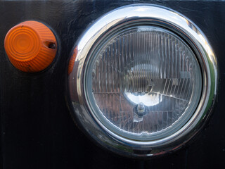 vintage headlight of black car