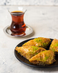 BAKLAVA or SOBIYET. Traditional Turkish Desserts Baklava with Turkish Tea.