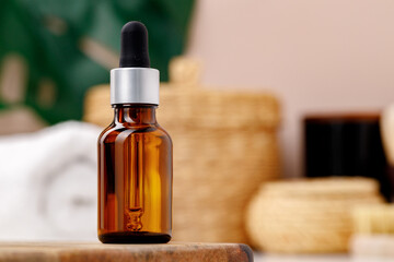 Cosmetic dark amber glass bottle with pipette