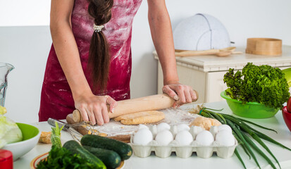 girl kid in chef apron and hat cooking, cuisine