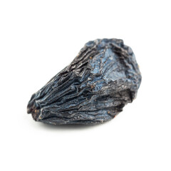Dark blue raisins isolated on white background, close-up view