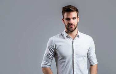 young handsome man in formal wear has bristle on face, office life