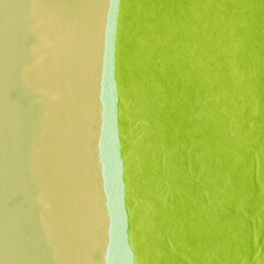 Green torn paper collage close-up. Texture made from various paper and cardboard parts. Damaged old...