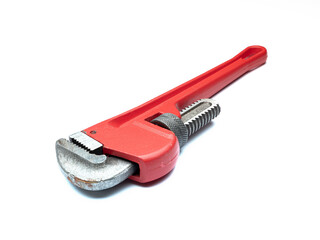 Large red wrench for various repairs,which is isolated