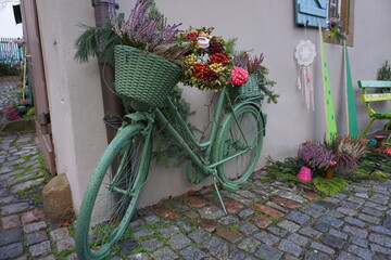 Fototapeta na wymiar flowers on a bike