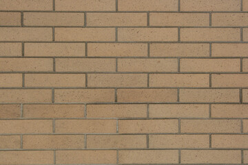 Tan brick wall background texture