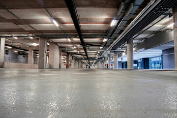 Parking garage underground with vacant places for cards.