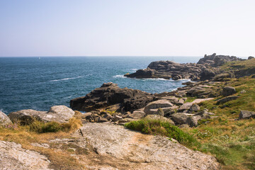 Fototapeta na wymiar Peninnis Head: Piper's Hole and Outer Head, St. Mary's, Isles of Scilly, England, UK, on a calm Summer's day