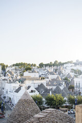 Naklejka premium View of Italian village Alberobello, Apulia, Italy with traditional house called Trulli. travel destination Italy.