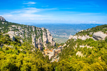 Aerial view of Montserrat mountains and Benedictine monastery of Santa Maria de Montserrat