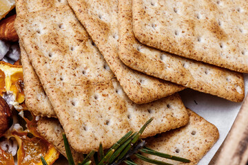 delicious wheat flour cookies and chocolate drops inside the prepared shortbread dough, homemade cookies of irregular round or oval shape, closeup