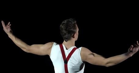 Close up of a circus performer posing on stage on dark background, 4k