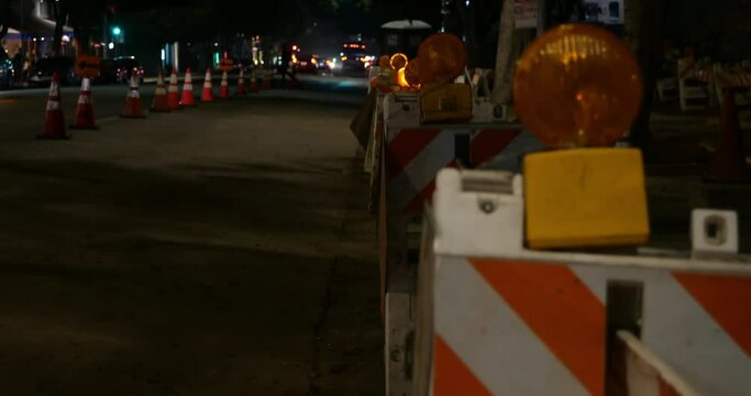 A road construction zone at night in the city
