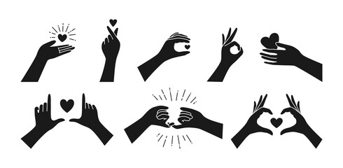 Valentine black silhouette icon set, hand holding heart. Finger love symbol, Hands gestures Korean love sign. Minimalist trend style. Design print greeting card, vector illustration isolated