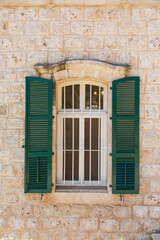 Vintage window with arch. Architecture elements of old town. Castle style