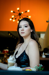 
Girl sitting in a coffee