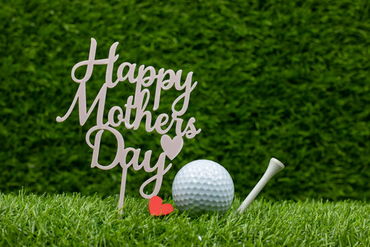 Golf Mother's Day with golf ball and word on green grass