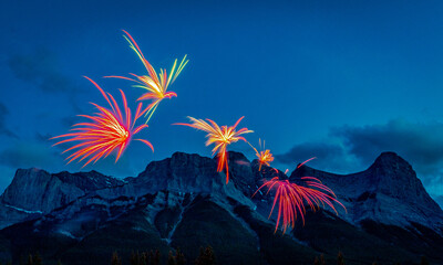 fireworks over mountains