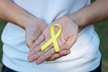 Suicide prevention, Sarcoma, bone, bladder, Childhood cancer Awareness month, Yellow Ribbon for supporting people living and illness. children Healthcare and World cancer day concept