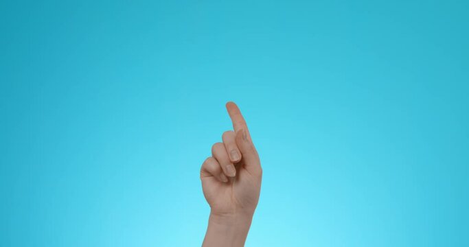 Man shows finger designation gesture.