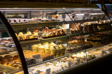 Shelf of donuts and desserts