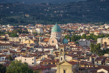 Fototapeta premium Above the roofs of Florence on a sunny September evening. Italy